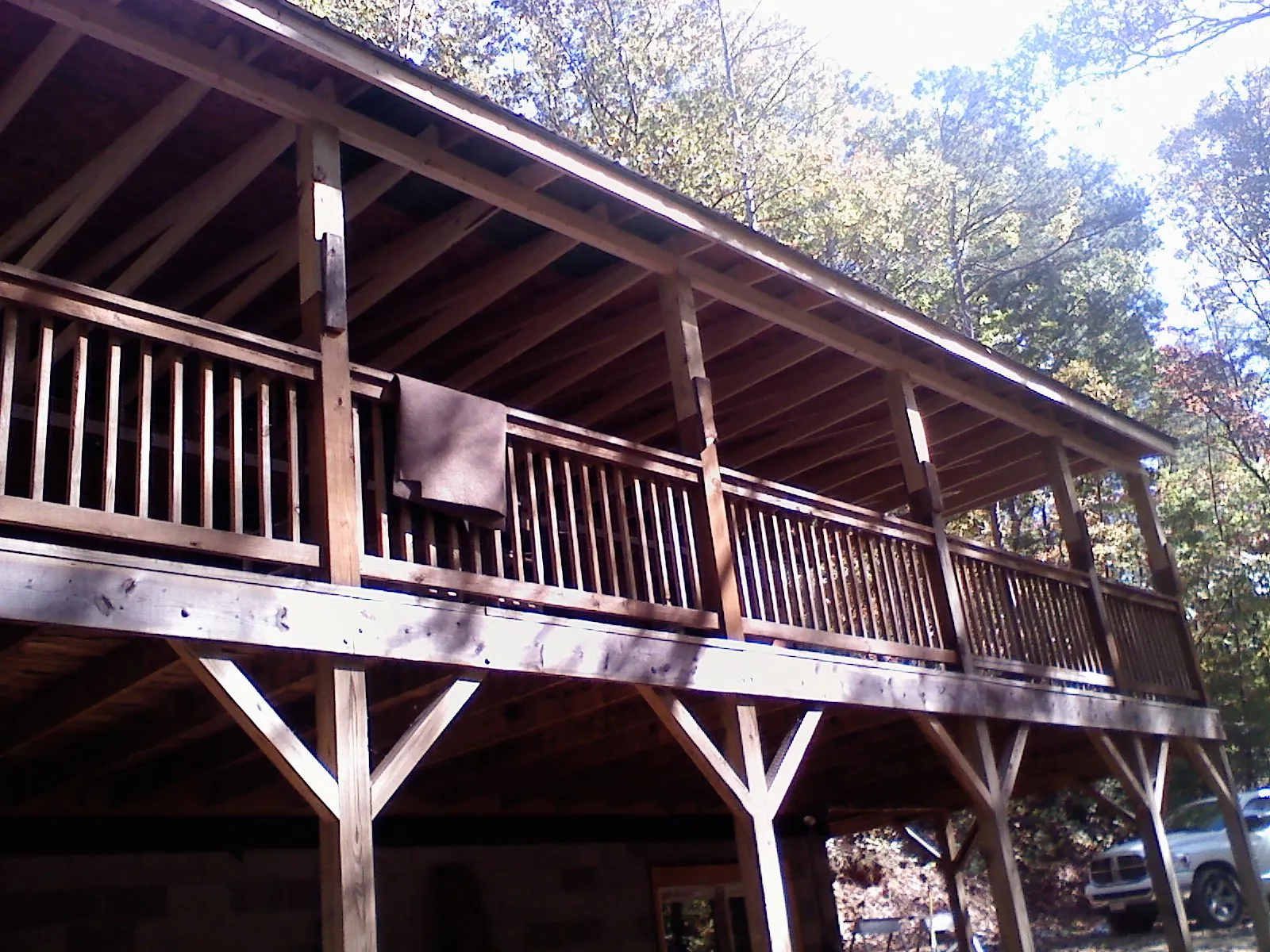 Timber framing under a new elevated porch and deck — Roof Leak Repair in Breesport by Roofing Brothers
